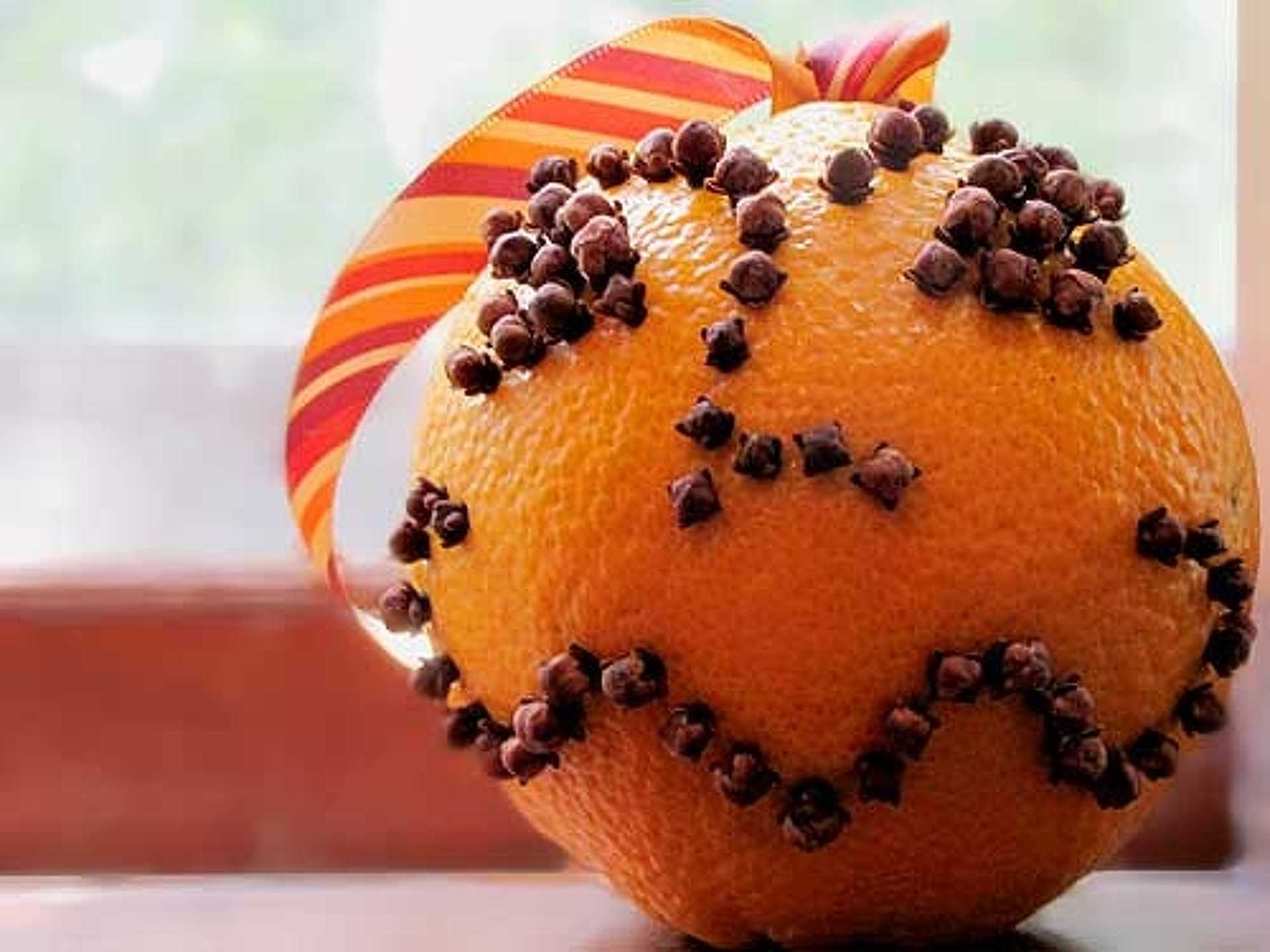 3. Orange decorated with carnations