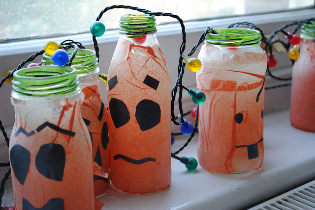 4. Glass jars decorated with tissue paper and flasher