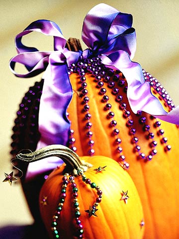 1. Glamorous pumpkin made of beads and ribbons