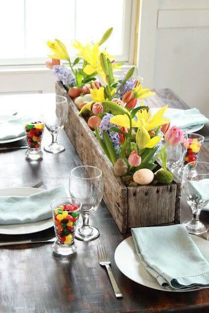 9. Arrangement with colourful flowers and eggs