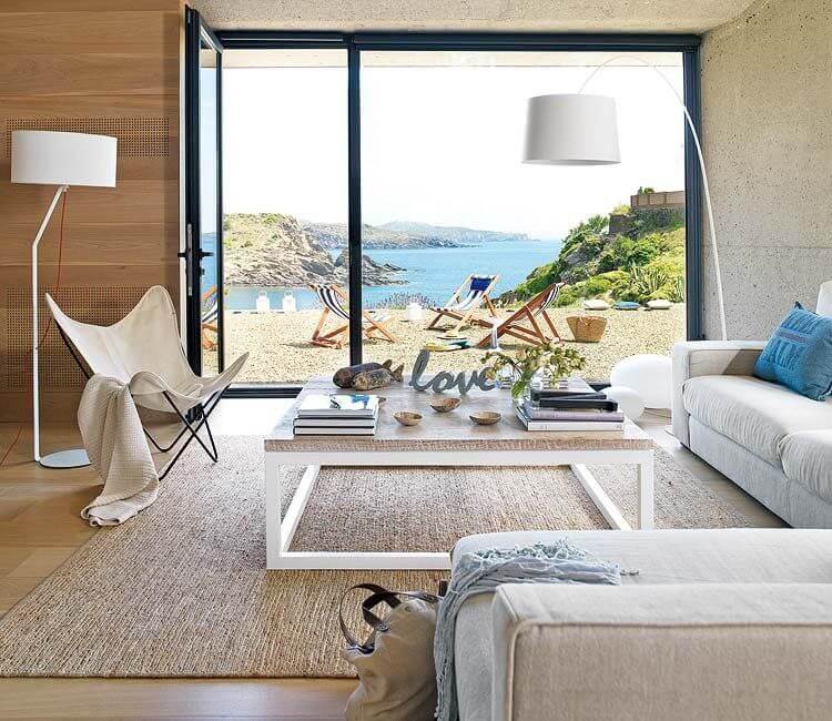 17. A LIVING ROOM WITH SEA VIEWS