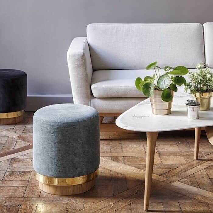 Pouffe with metallic details