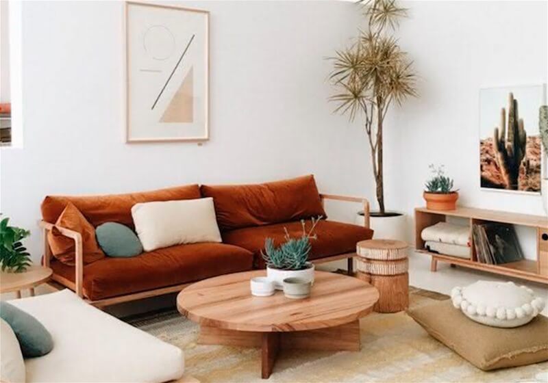 1. Brown sofa with neutral pillows