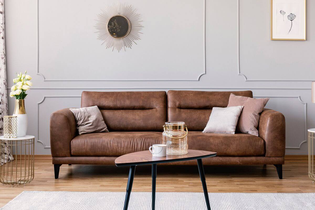 4. Brown sofa with mono-color pillows