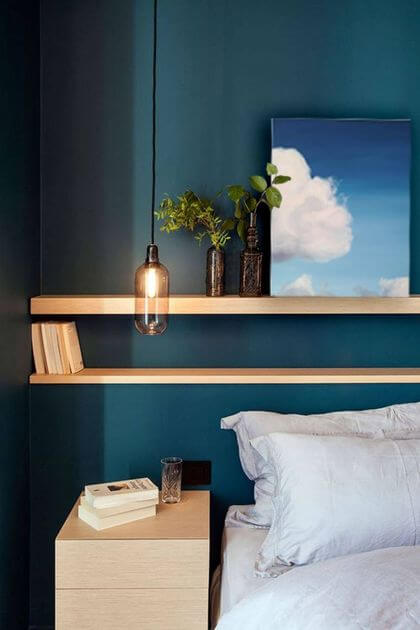 14- Two wooden shelves line up in parallel for an elegant headboard 
