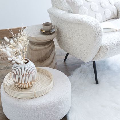 5- Bouclé wool is available on all the seats in the living room