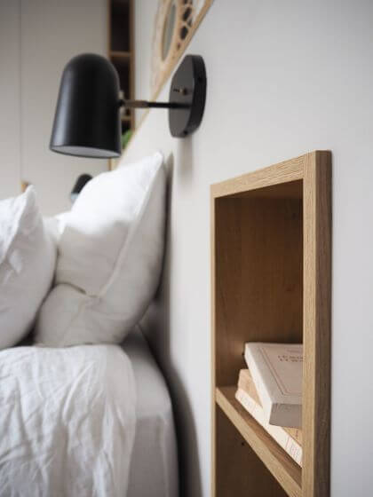 9- Shelves like niches to store your bedside books in style 