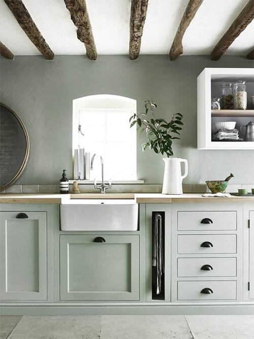 Kitchens with cabinets painted green